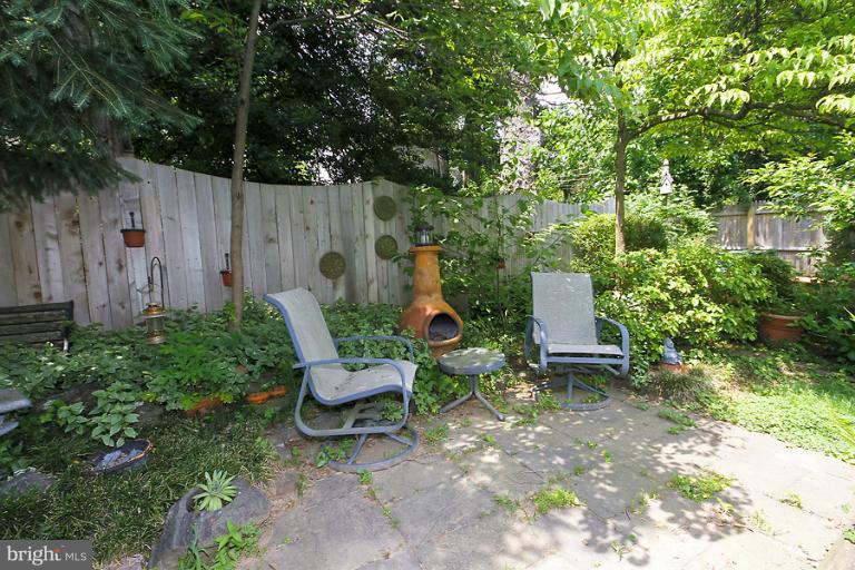 2105 Hanover Street Silver Spring, MD 20910 - Photo 1 of 23 a view of chair in a backyard