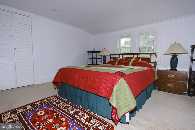 2105 Hanover Street Silver Spring, MD 20910 - Photo 14 of 23 a bedroom with a bed and window
