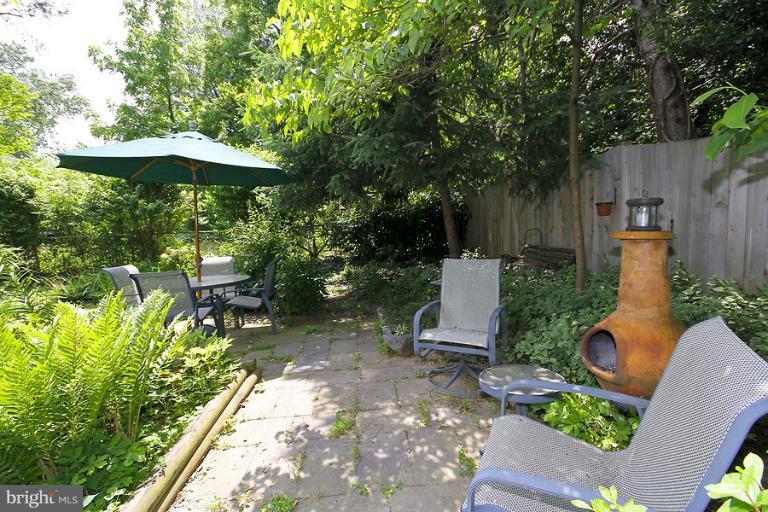 2105 Hanover Street Silver Spring, MD 20910 - Photo 15 of 23 an outdoor space with furniture and umbrella