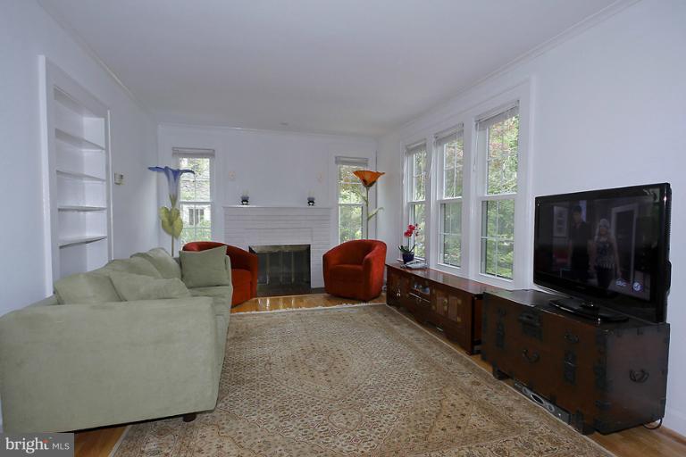 2105 Hanover Street Silver Spring, MD 20910 - Photo 16 of 23 a living room with furniture windows and flat screen tv