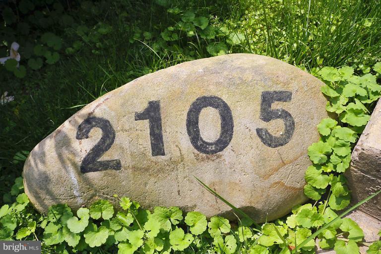 2105 Hanover Street Silver Spring, MD 20910 - Photo 20 of 23 a close up of a sign broad in a yard