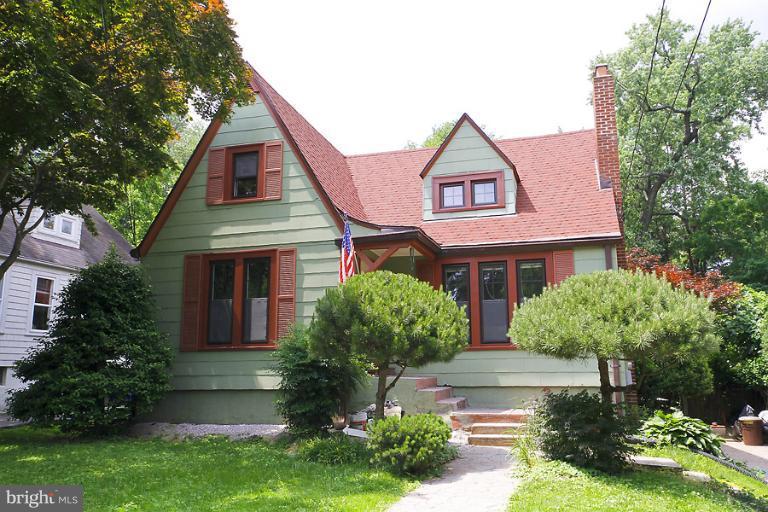 2105 Hanover Street Silver Spring, MD 20910 - Photo 23 of 23 a front view of a house with garden