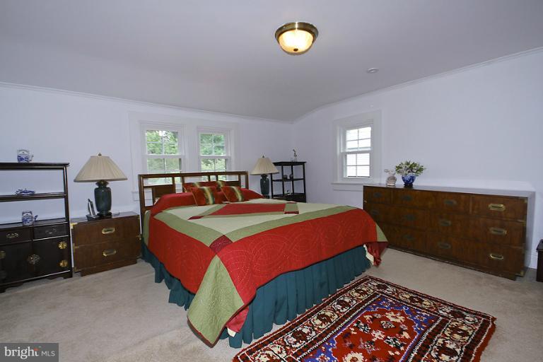 2105 Hanover Street Silver Spring, MD 20910 - Photo 9 of 23 a bedroom with a bed and window