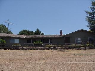 a front view of house with yard