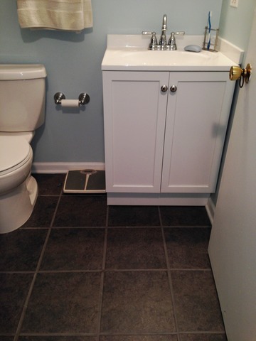 714 Inverrary Lane Deerfield, IL 60015 - Photo 12 of 17 a bathroom with a sink toilet and shower