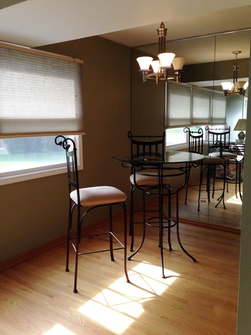 714 Inverrary Lane Deerfield, IL 60015 - Photo 5 of 17 a dining room with furniture and wooden floor