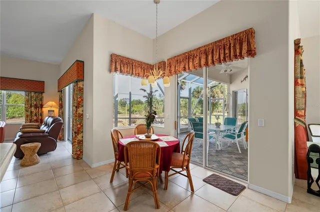 a kitchen with stainless steel appliances a refrigerator and microwave