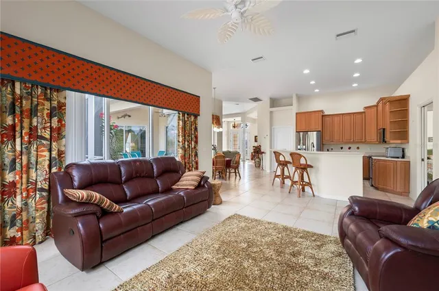 a spacious bathroom with a granite countertop tub sink and mirror