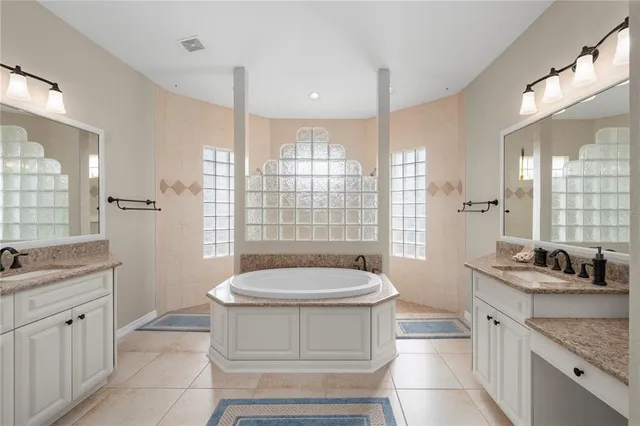 a bathroom with a shower and a sink