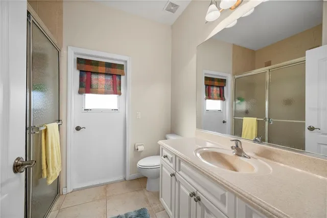 a dining room with furniture and outdoor view