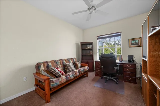 a view of a house with swimming pool and a yard