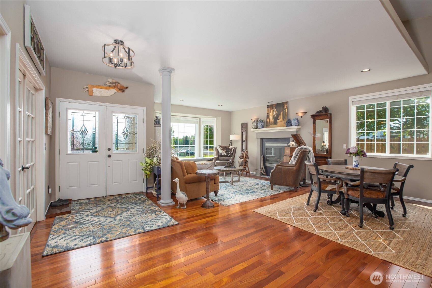 29216 39th Avenue South Roy, WA 98580 - Photo 11 of 38 a living room with furniture and a wooden floor