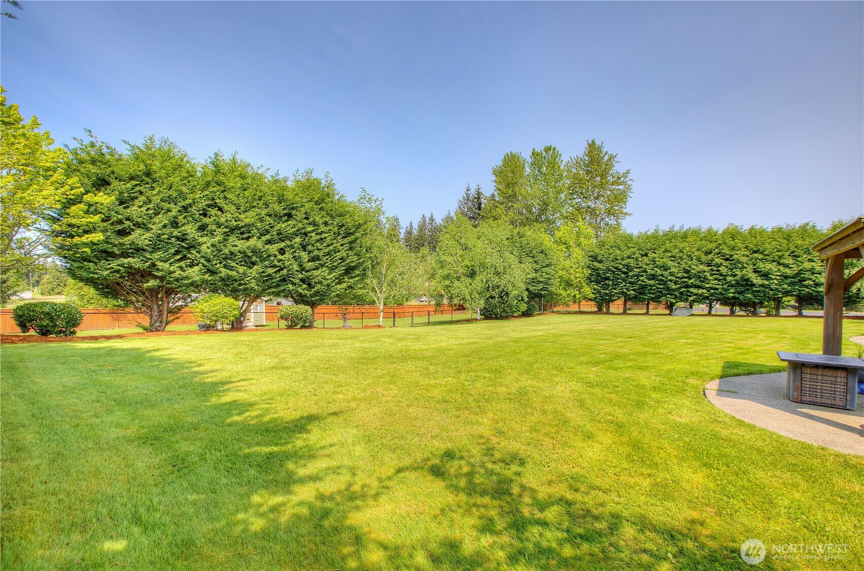 29216 39th Avenue South Roy, WA 98580 - Photo 37 of 38 a view of yard with swimming pool and green space