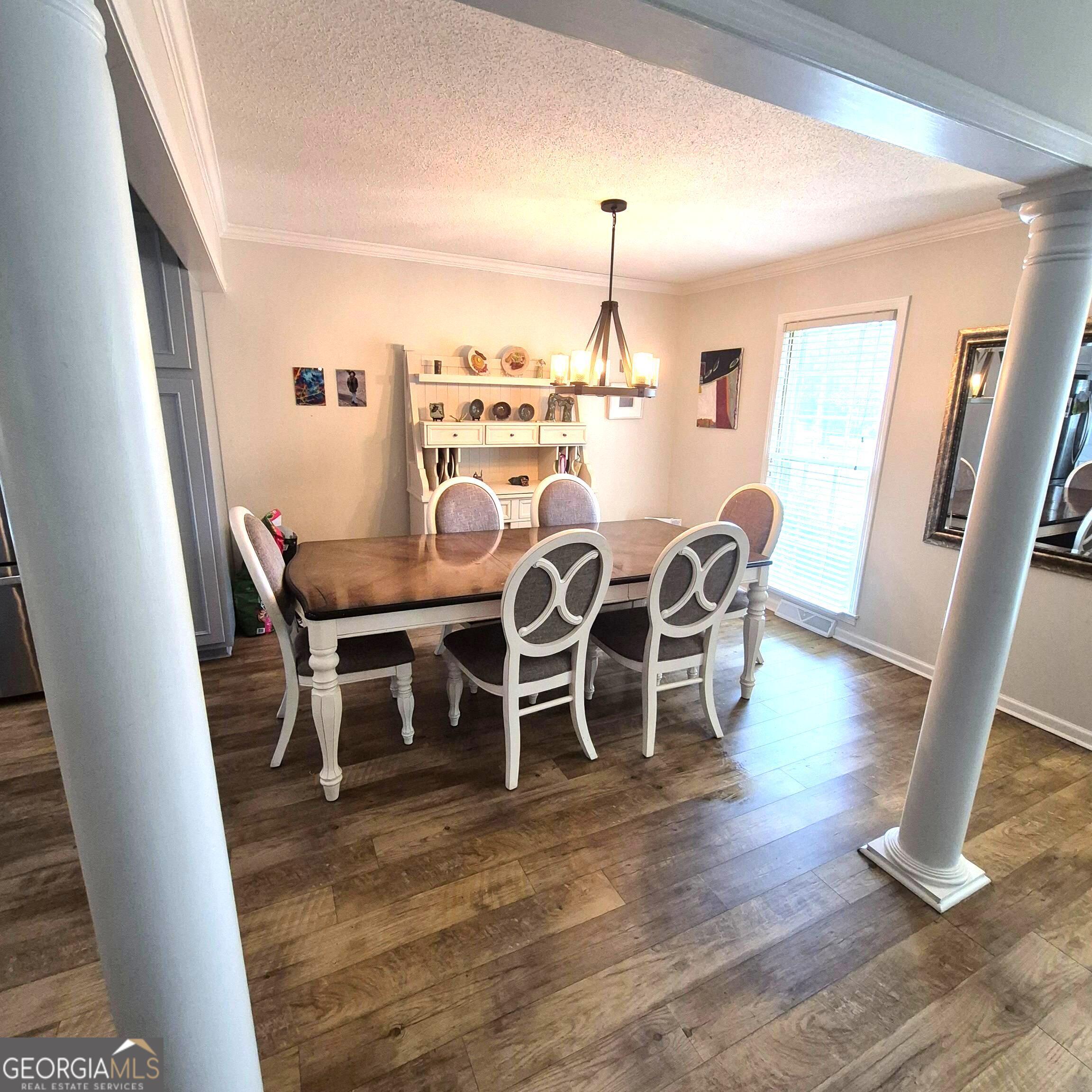 930 Hill Place Macon, GA 31210 - Photo 12 of 34 a view of a dining room with furniture window and wooden floor