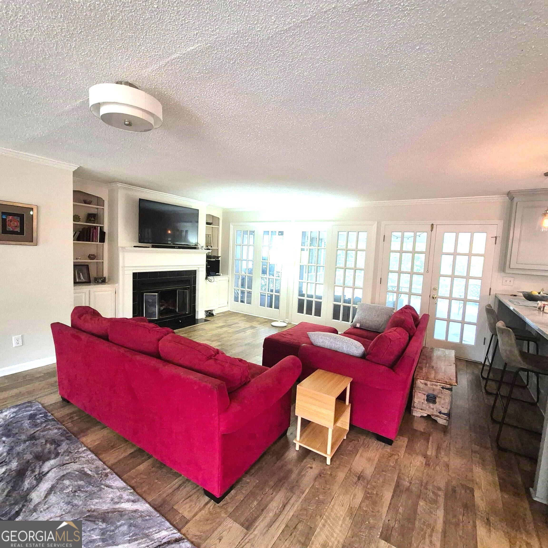 930 Hill Place Macon, GA 31210 - Photo 14 of 34 a living room with furniture fireplace and a large window
