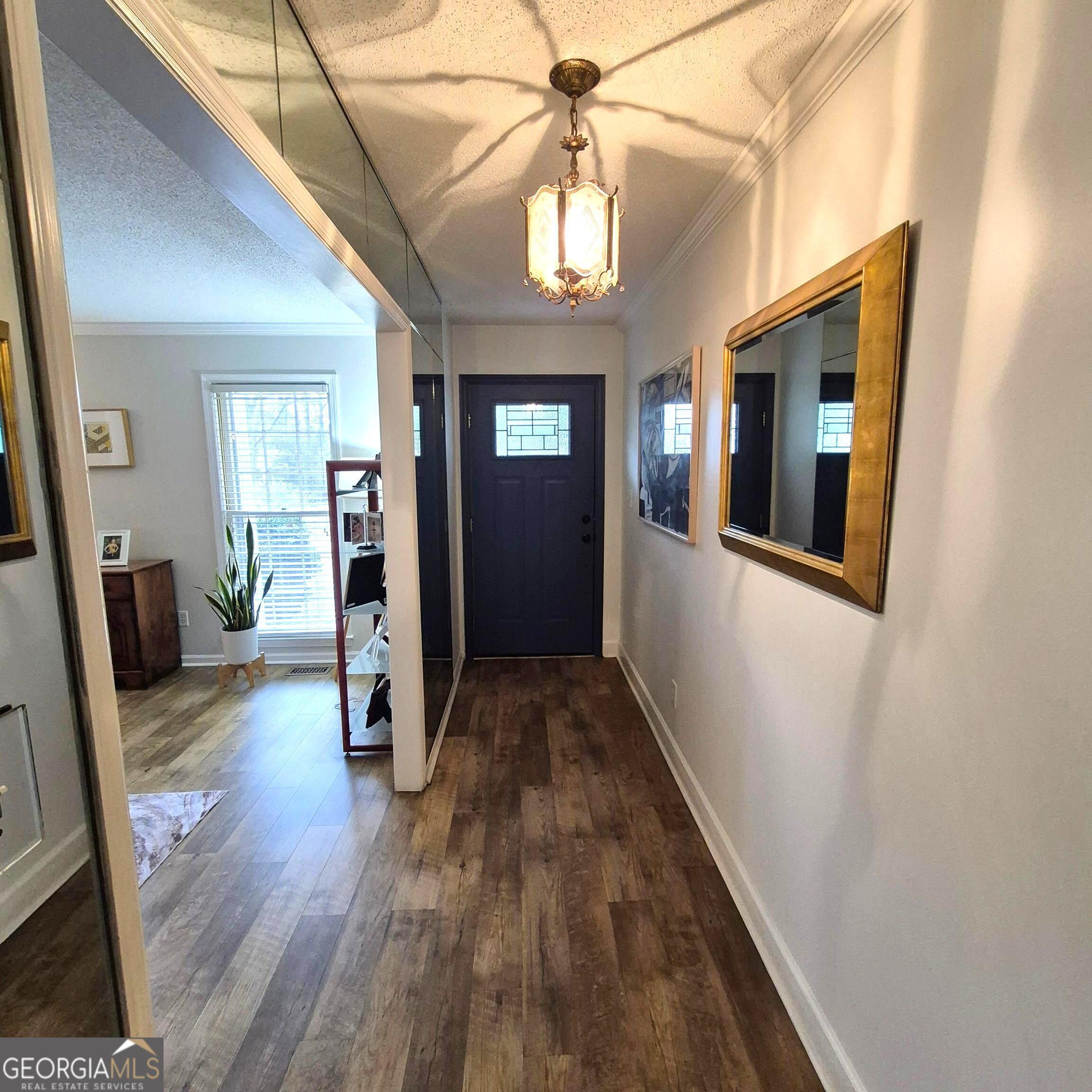 930 Hill Place Macon, GA 31210 - Photo 18 of 34 a view of a livingroom with wooden floor and furniture
