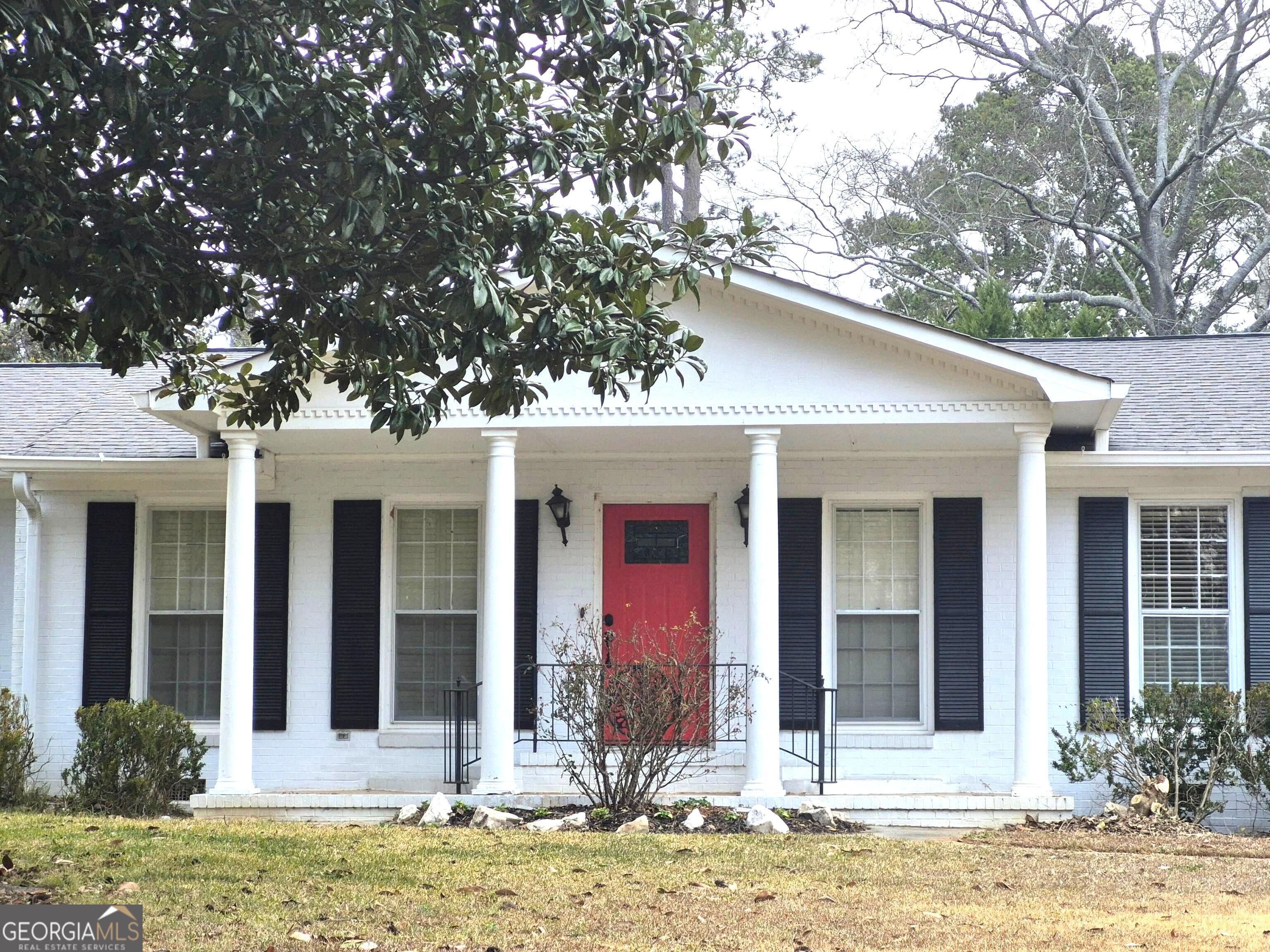 930 Hill Place Macon, GA 31210 - Photo 2 of 34 front view of a house with a yard