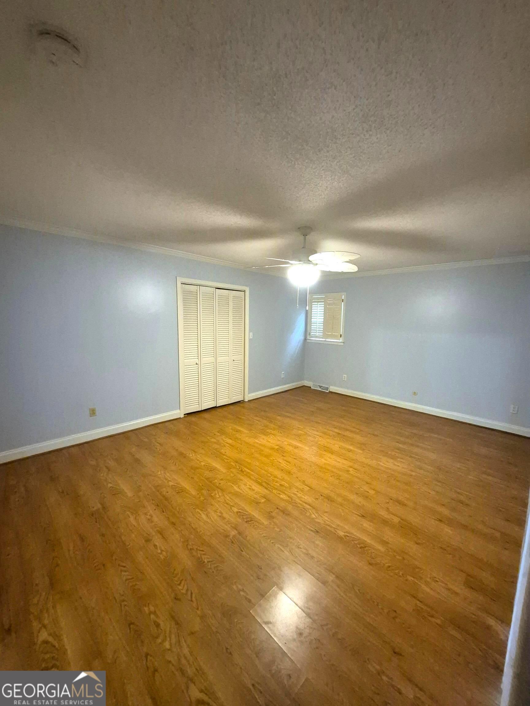 930 Hill Place Macon, GA 31210 - Photo 22 of 34 an empty room with a empty space and windows