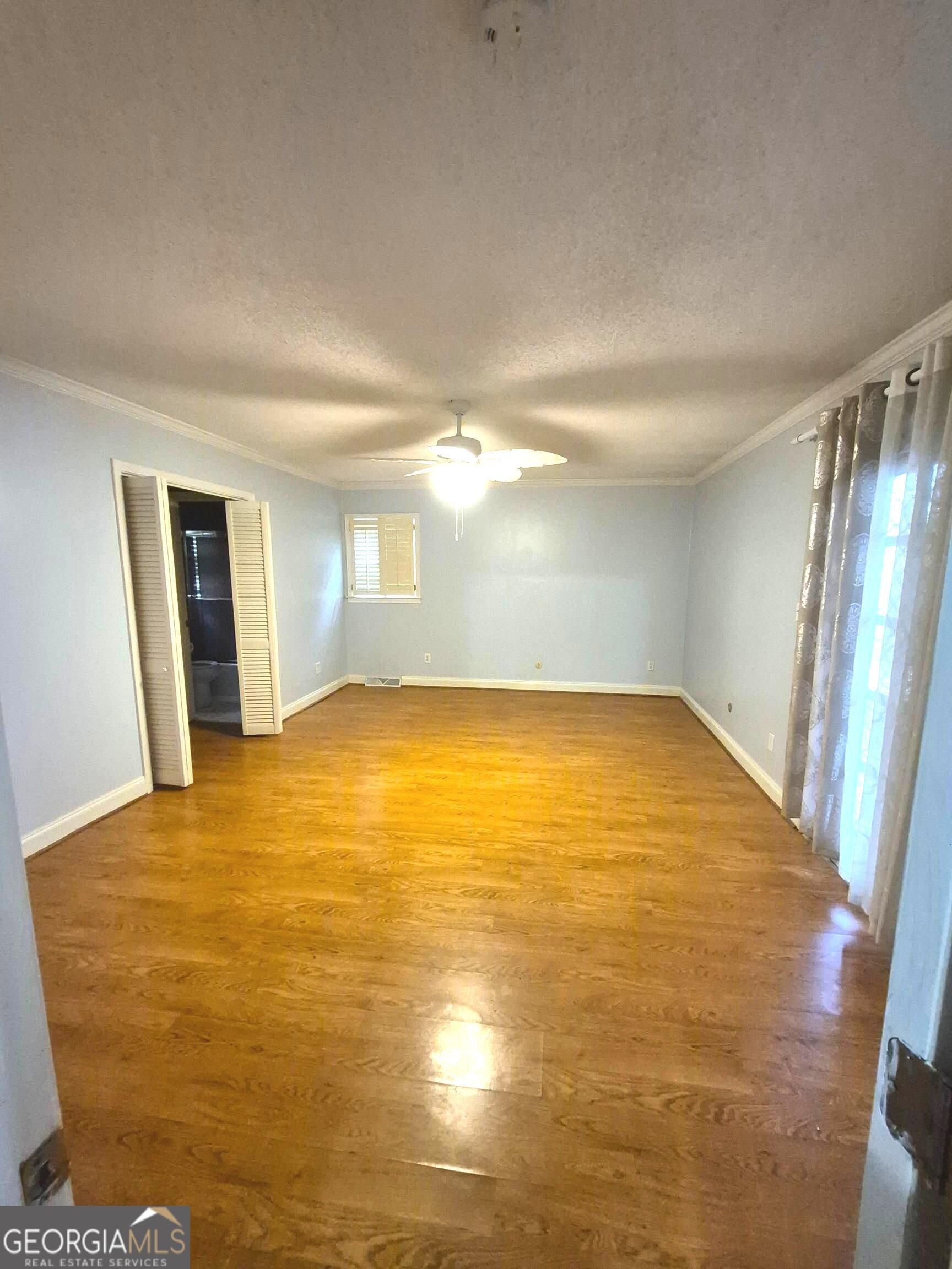 930 Hill Place Macon, GA 31210 - Photo 27 of 34 a view of empty room with wooden floor