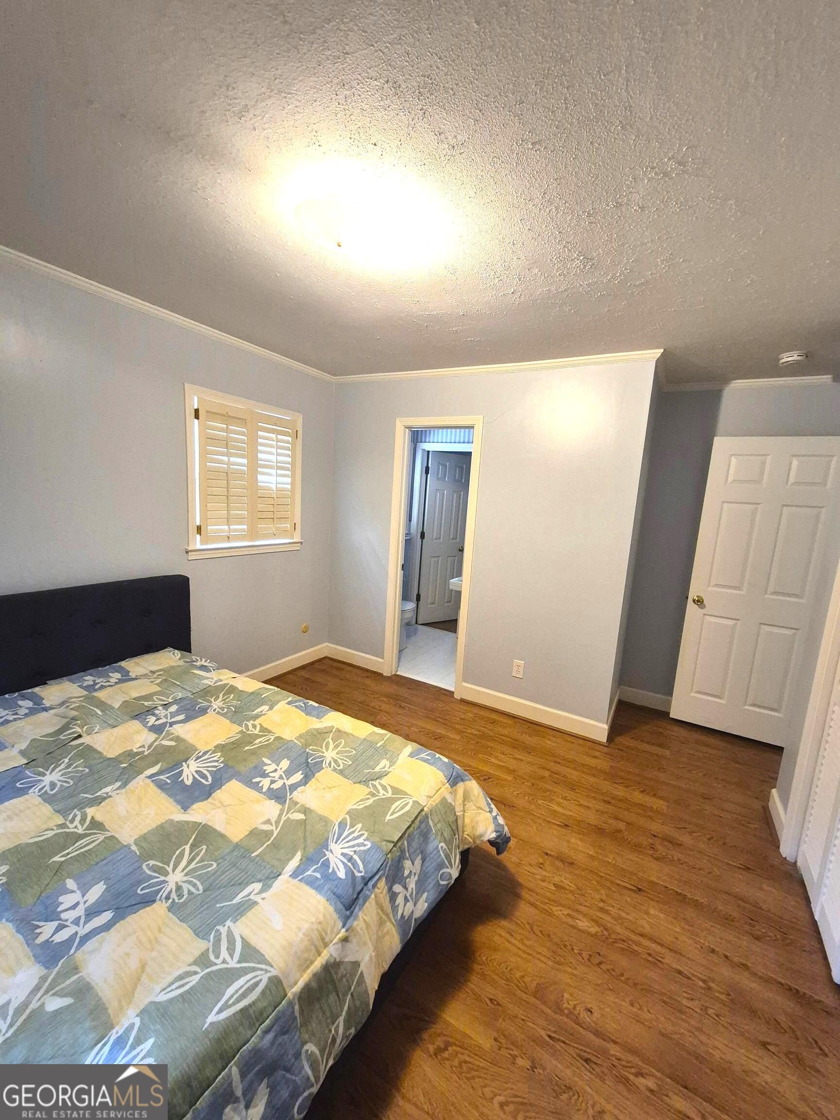 930 Hill Place Macon, GA 31210 - Photo 33 of 34 a bedroom with a bed and a window