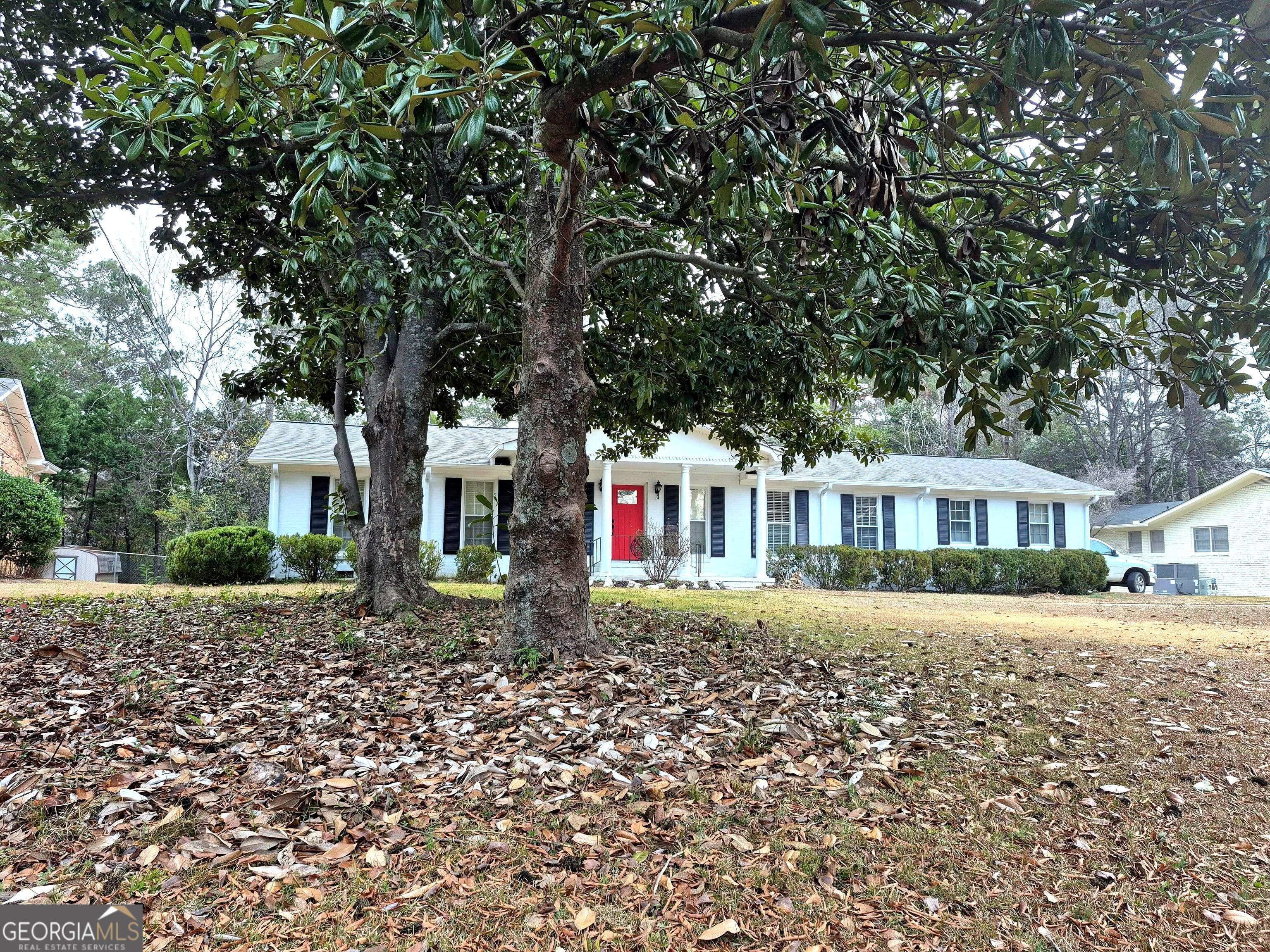 930 Hill Place Macon, GA 31210 - Photo 4 of 34 a front view of a house with a yard