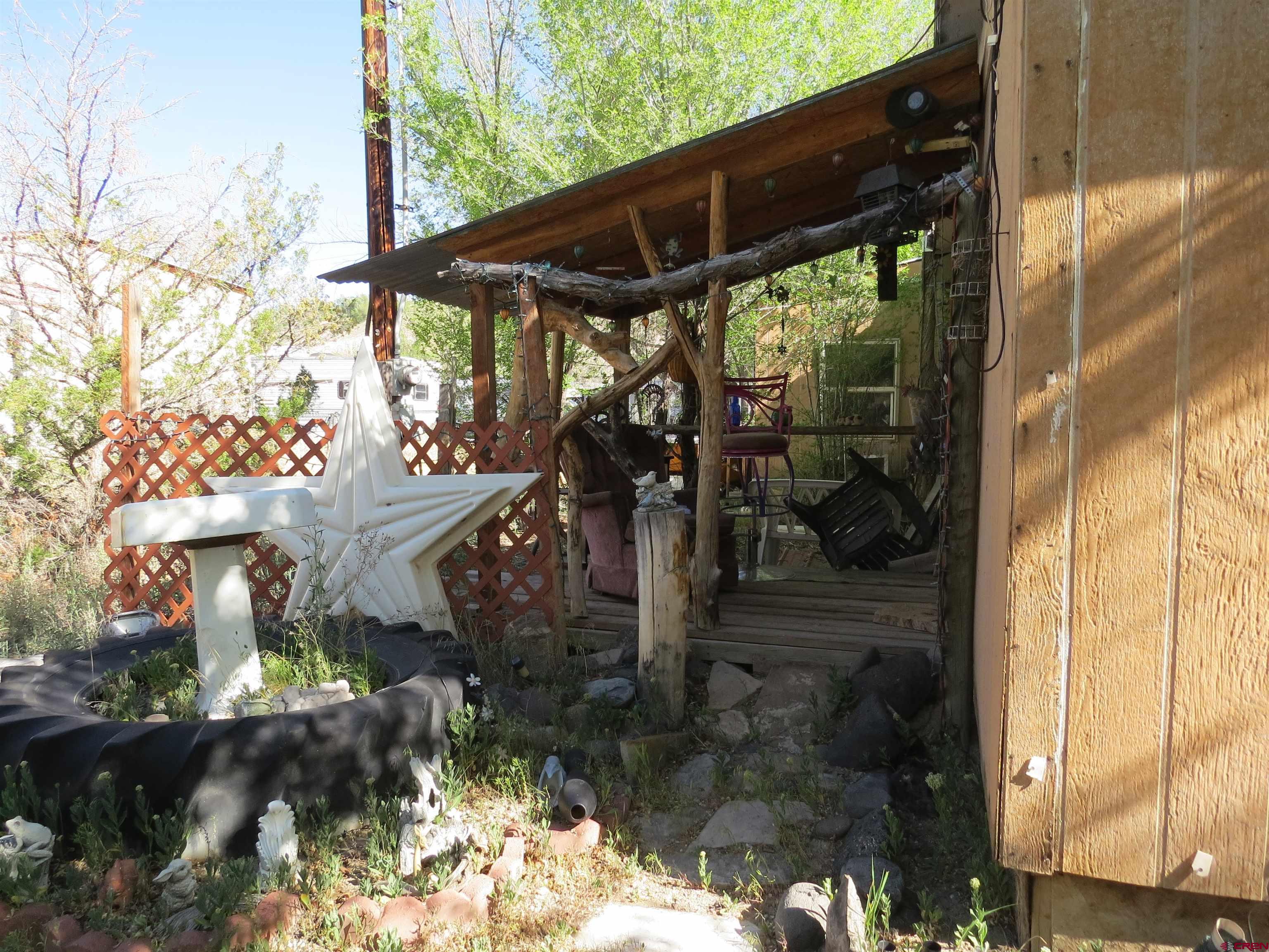 22203 Canal Street Austin, CO 81410 - Photo 16 of 20 a view of a house with a wooden floor