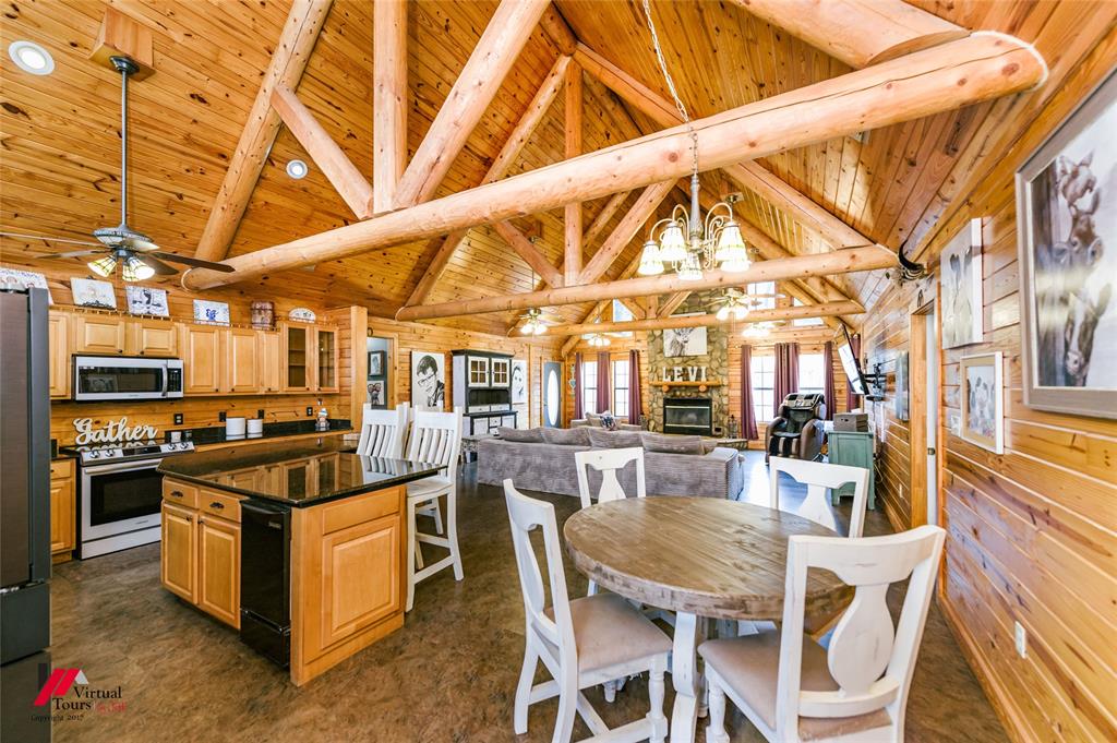 550 Middleton Road Stonewall, LA 71078 - Photo 16 of 40 a view of a kitchen with stainless steel appliances granite countertop lots of counter top space