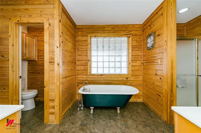 a bathroom with a sink a mirror and a shower