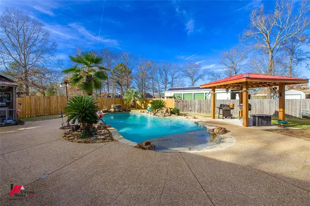 a view of a house with a patio