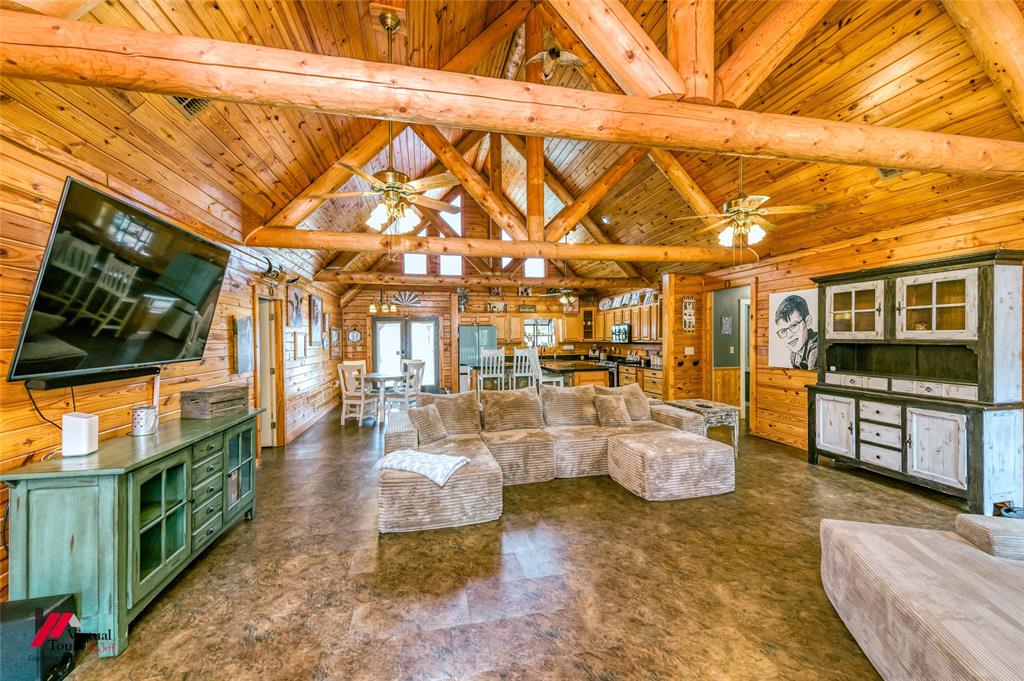 550 Middleton Road Stonewall, LA 71078 - Photo 6 of 40 a living room with furniture and a flat screen tv