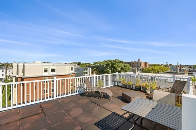 a view of a balcony with city view