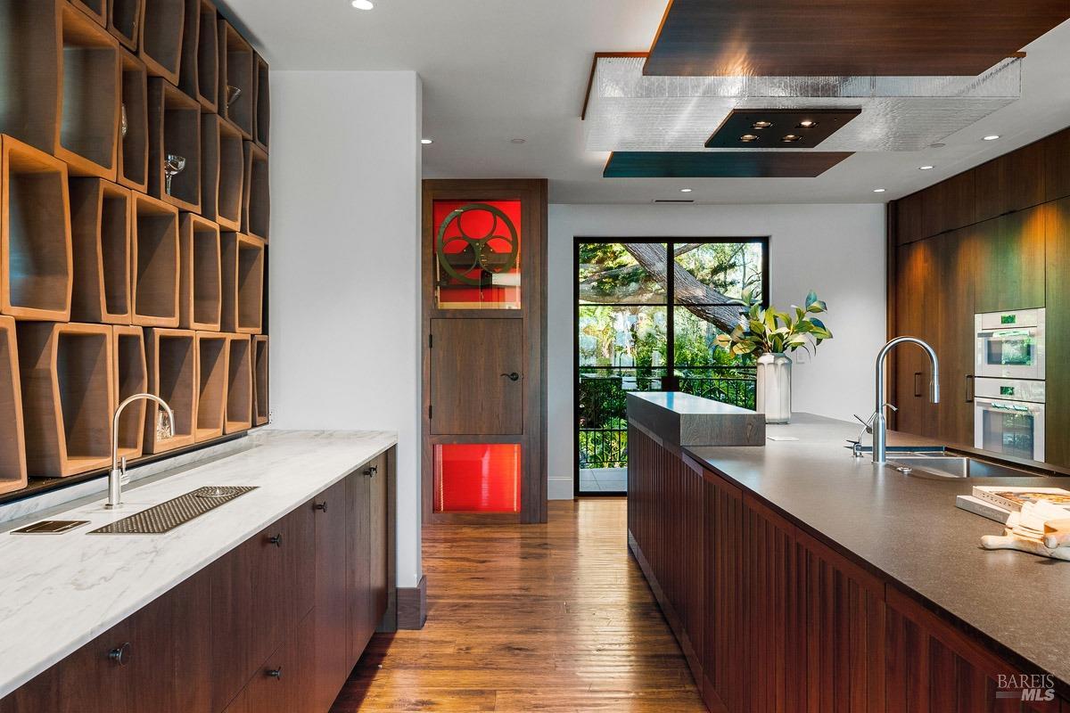 608 Seminary Drive Mill Valley, CA 94941 - Photo 15 of 67 a kitchen with granite countertop a sink stove and cabinets