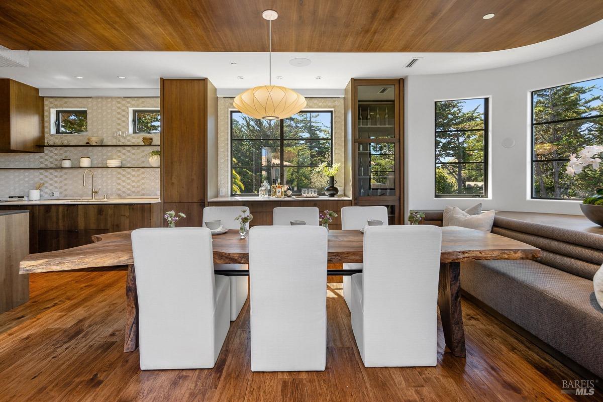 608 Seminary Drive Mill Valley, CA 94941 - Photo 23 of 67 a living room with furniture a flat screen tv and a large window