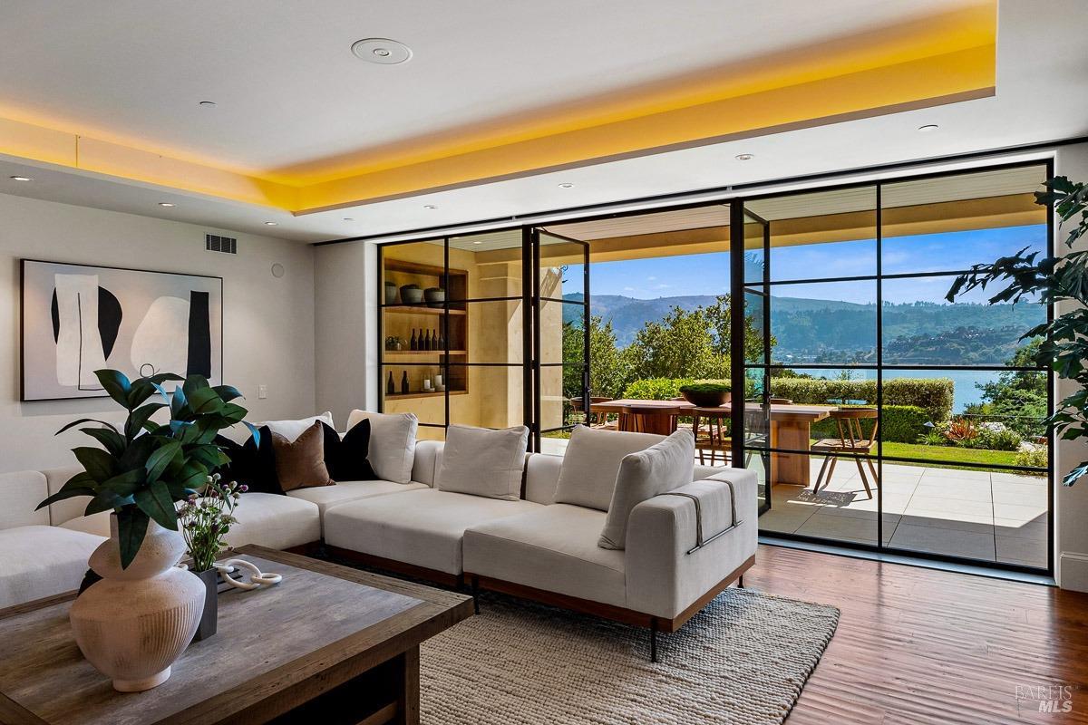 608 Seminary Drive Mill Valley, CA 94941 - Photo 26 of 67 a living room with furniture and floor to ceiling windows
