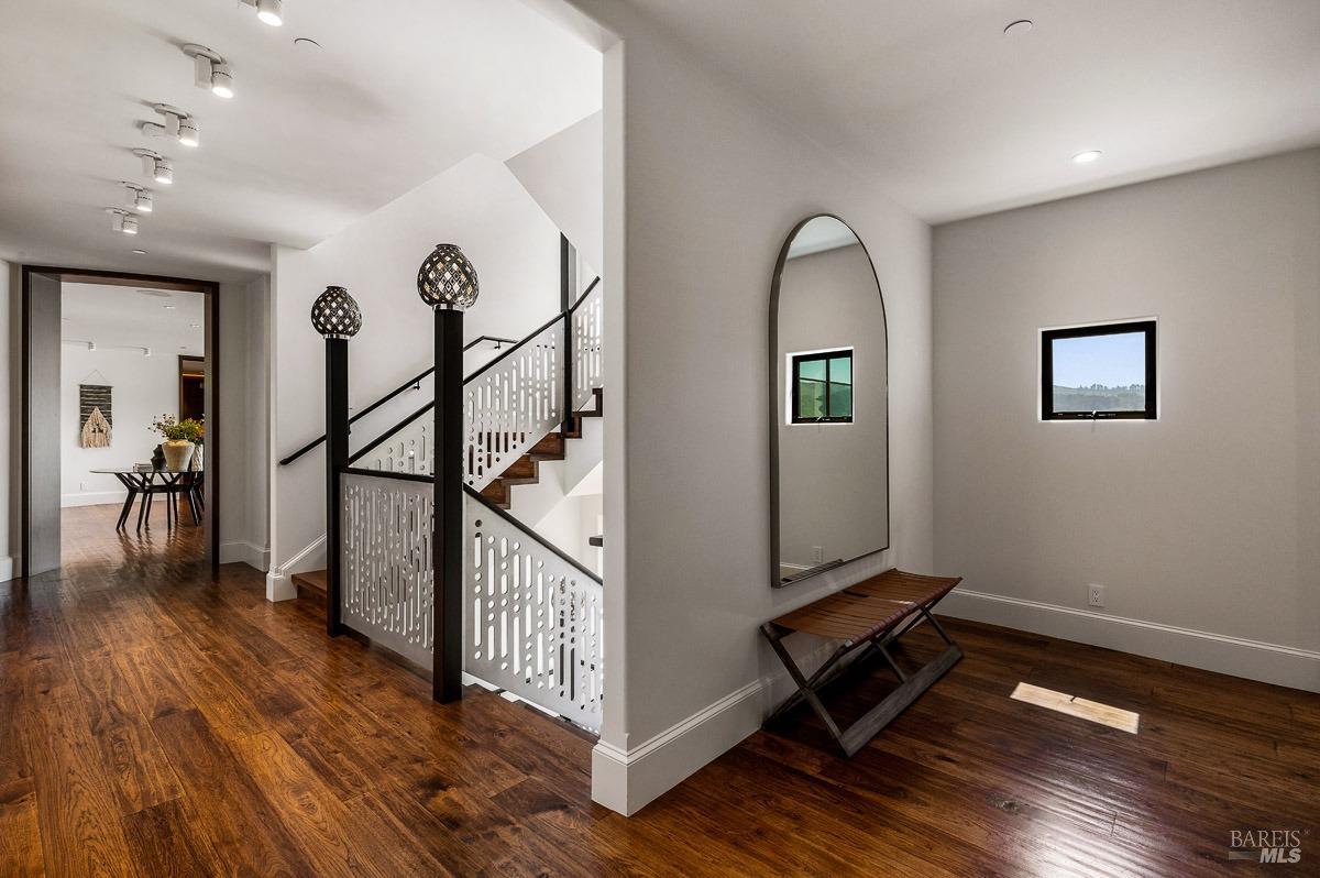 608 Seminary Drive Mill Valley, CA 94941 - Photo 46 of 67 a view of a room with wooden floor windows and stairs