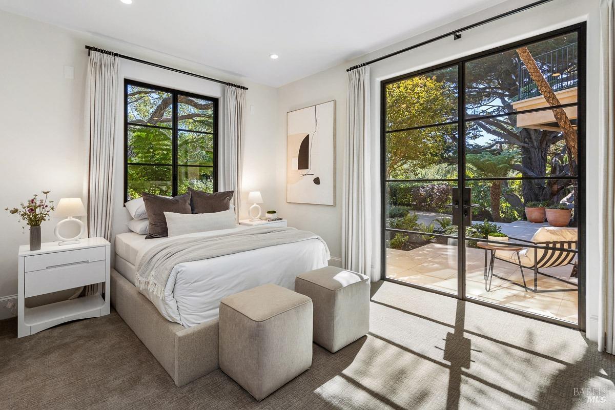 608 Seminary Drive Mill Valley, CA 94941 - Photo 50 of 67 a bedroom with a bed and a large window