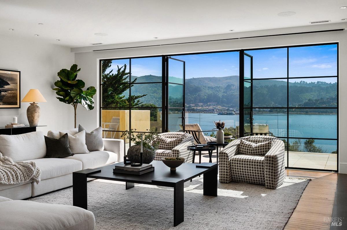 608 Seminary Drive Mill Valley, CA 94941 - Photo 8 of 67 a living room with furniture and a floor to ceiling window