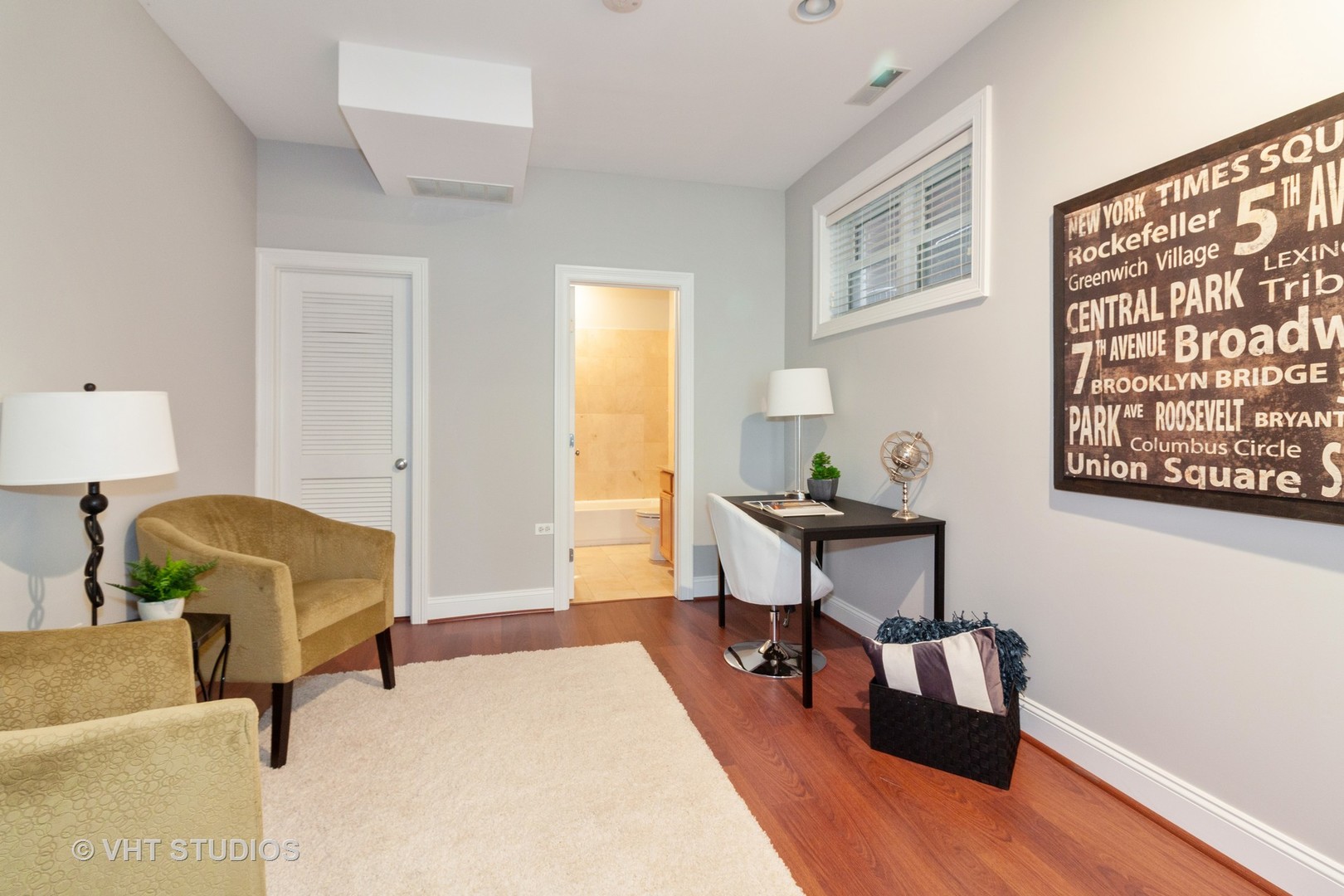 1345 West Fillmore Street, Unit 1 Chicago, IL 60607 - Photo 12 of 26 a living room with furniture and a potted plant