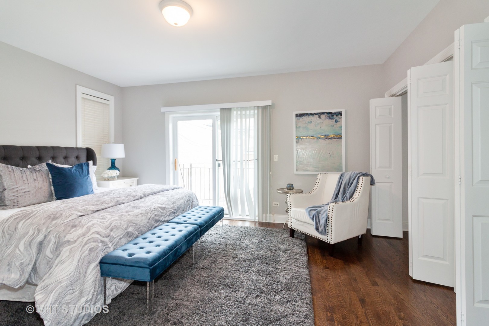 1345 West Fillmore Street, Unit 1 Chicago, IL 60607 - Photo 14 of 26 a bed room with a bed and a couch