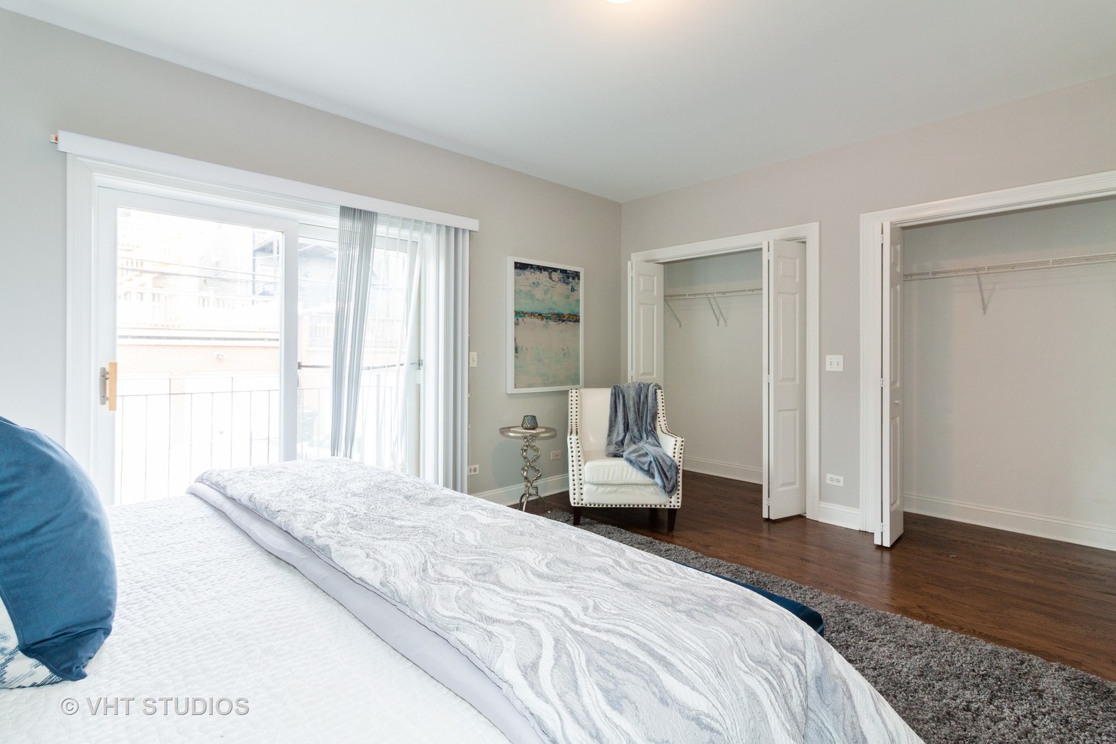 1345 West Fillmore Street, Unit 1 Chicago, IL 60607 - Photo 15 of 26 a bedroom with a bed and a large window