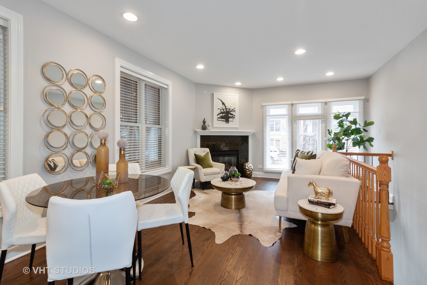 1345 West Fillmore Street, Unit 1 Chicago, IL 60607 - Photo 3 of 26 a living room with furniture a fireplace and a table