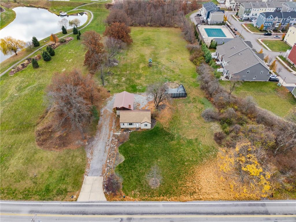 1165 Freeport Road Mars, PA 16046 - Photo 14 of 14 an aerial view of a house with a yard basket ball court and outdoor seating