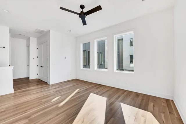 a kitchen with a sink and a refrigerator