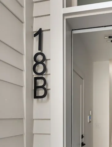 a view of a hallway with stairs
