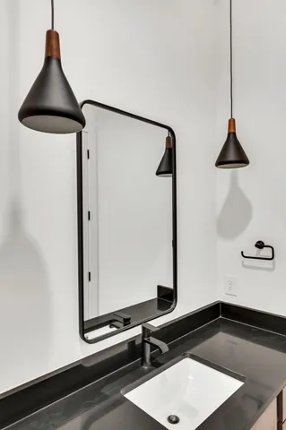 a view of hallway with wooden floor