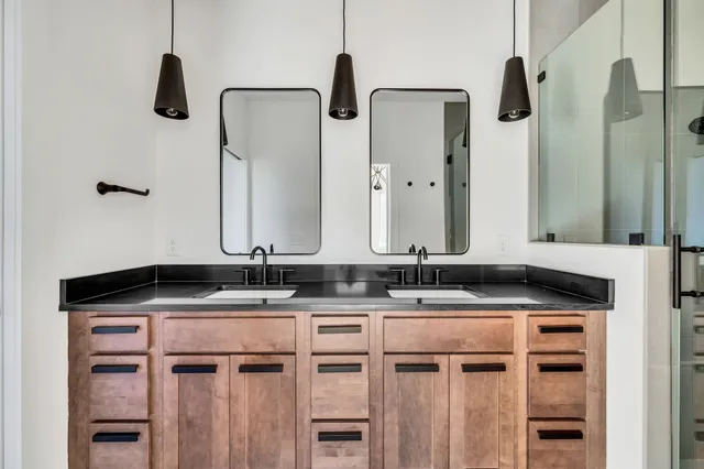 a bathroom with a bathtub and shower