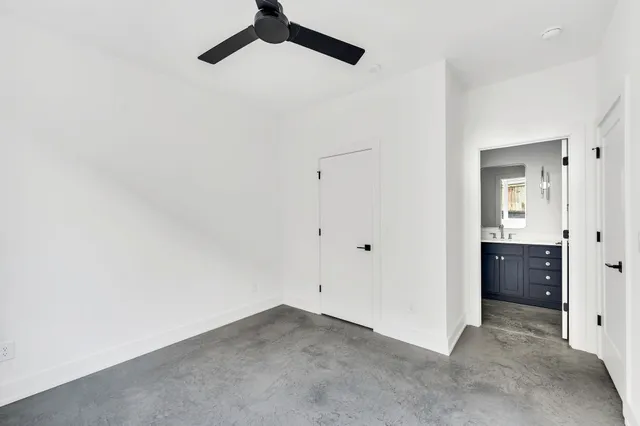 a bathroom with a sink vanity and a mirror
