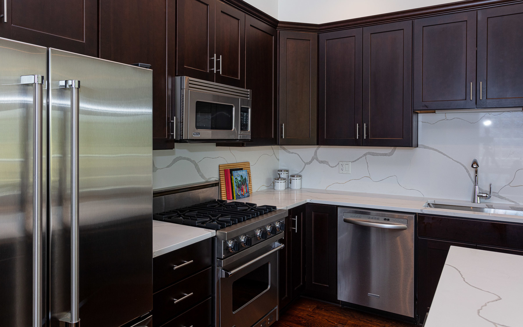 1838 West Rice Street, Unit 3 Chicago, IL 60622 - Photo 11 of 29 a kitchen with a sink stove and refrigerator