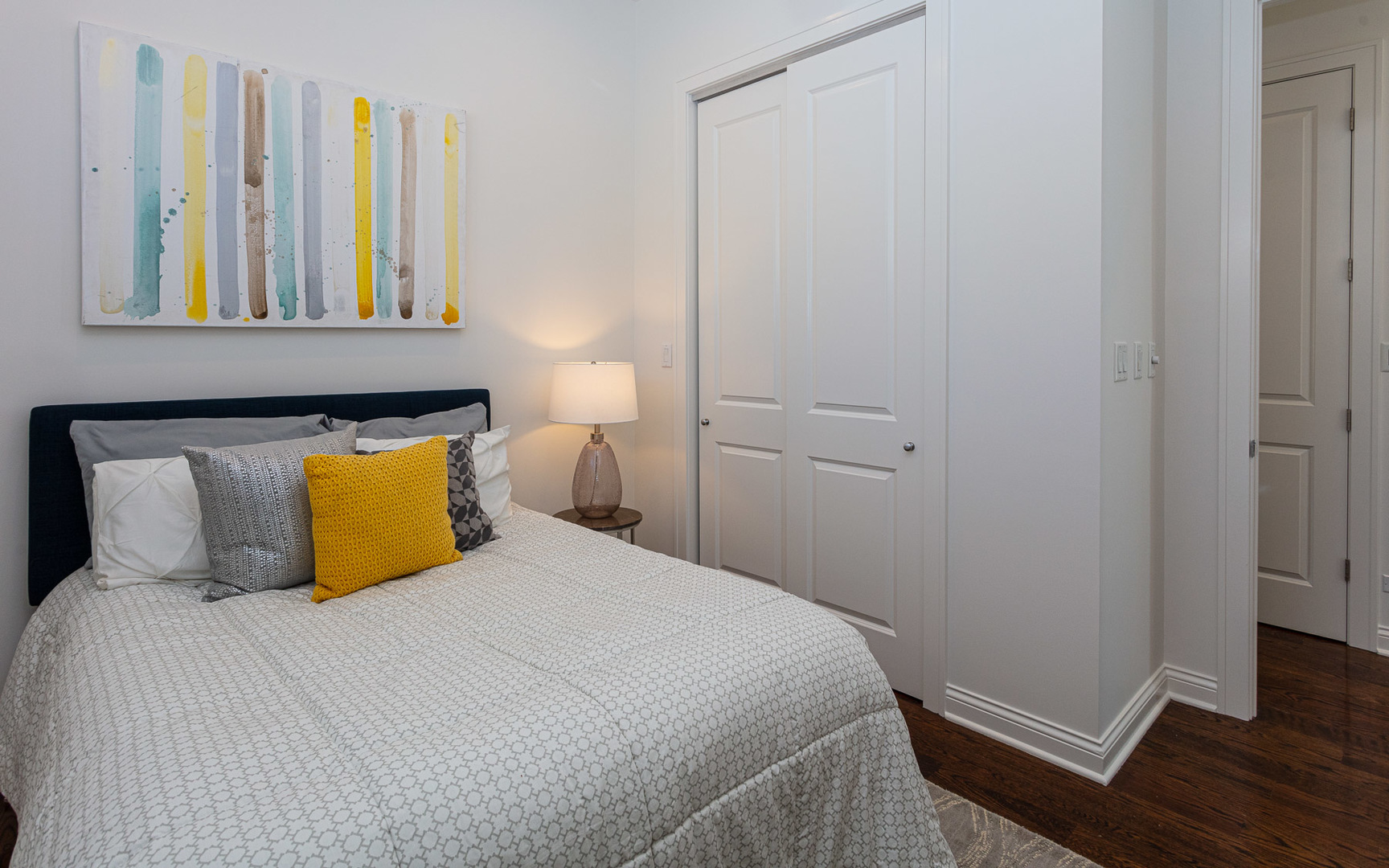 1838 West Rice Street, Unit 3 Chicago, IL 60622 - Photo 15 of 29 a bedroom with a bed and wooden floor