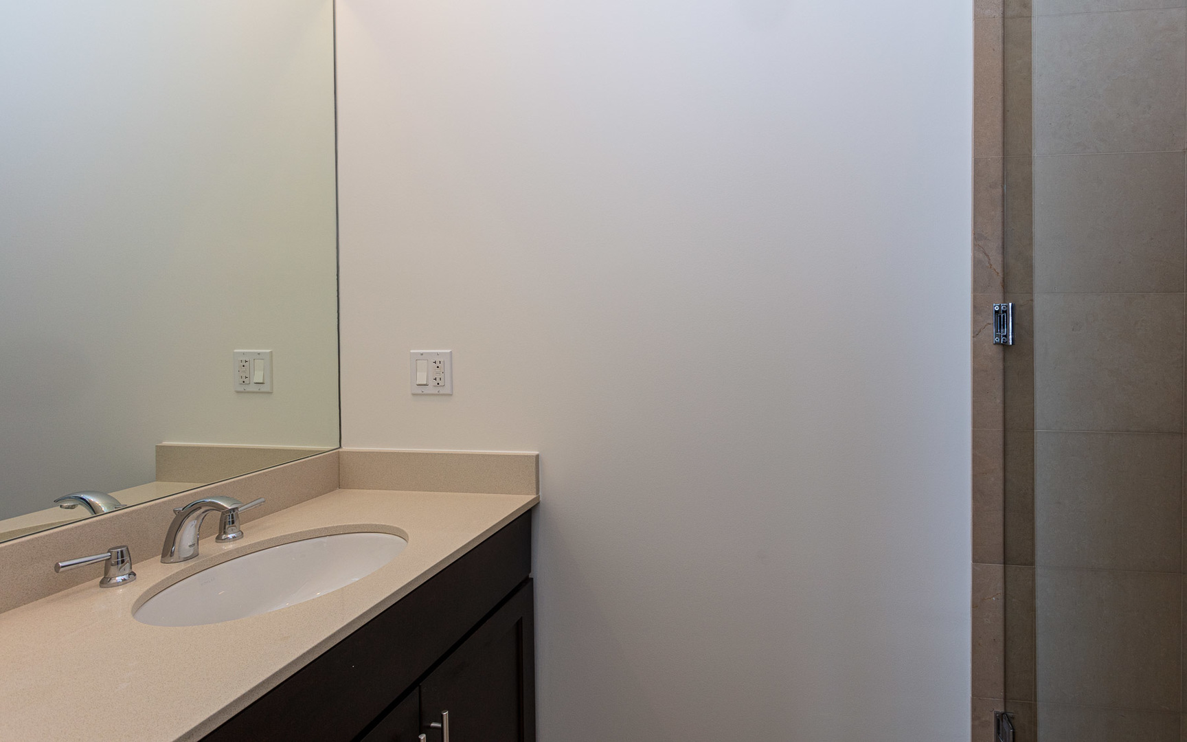 1838 West Rice Street, Unit 3 Chicago, IL 60622 - Photo 16 of 29 a bathroom with a sink and a mirror